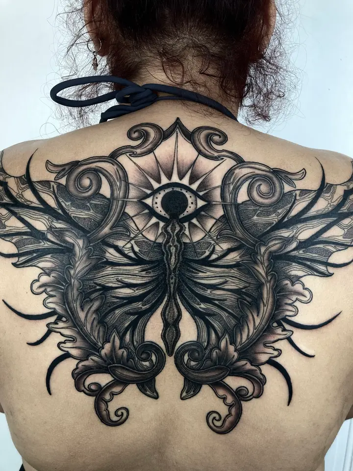 God Eye Butterfly — Blackwork tattoo by Nillattt, photo 1